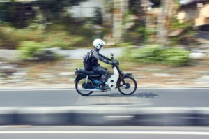 Fast moving moped with panning technique