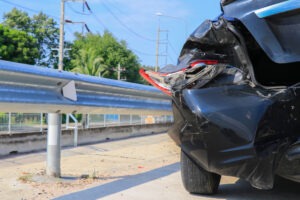 black car with rear-end collision damage